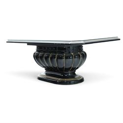 Italian Neoclassical inspired ebonised gloss coffee table, glazed cantered top with Greek key banding, on a shaped pedestal base with gilt highlights and stepped plinth 