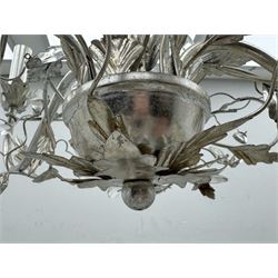 India Jane - silver finish metal chandelier, modelled with scrolling vines and leaves, embellished with faceted glass drops, fitted with six candle sconces, and wired for electricity