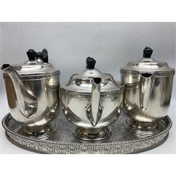 Viners of Sheffield silver-plate tea/coffee wares, the rims decorated with bands of flowers, and chased oval tray with swag decorated gallery, L39cm