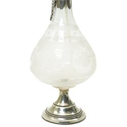 French glass decanter of baluster form with etched decoration and silver collar and foot H33cm