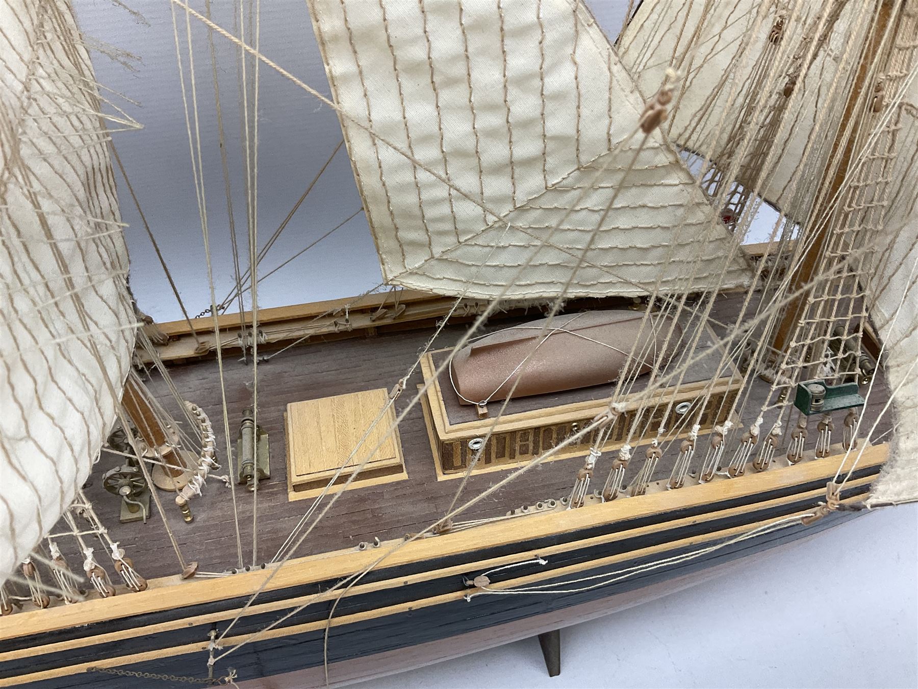 Three masted kit built sailing ship with cloth sales, deck fittings and full rigging, on open display, L110cm, H80cm  