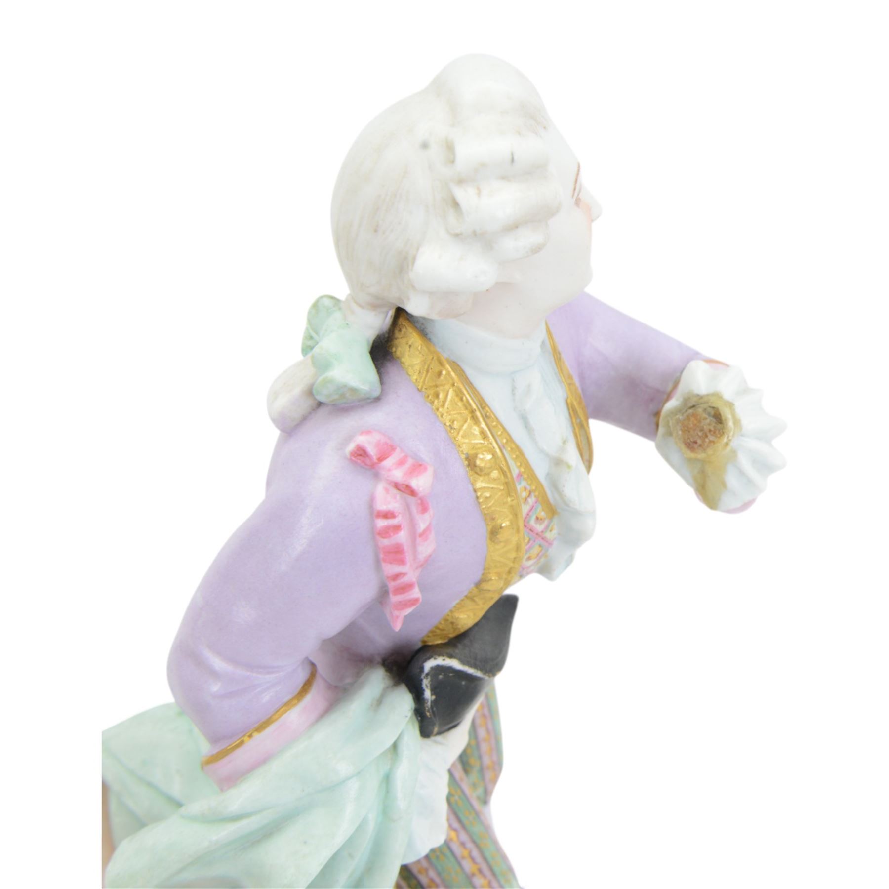 Pair of late 19th century French Letu & Mauger bisque figures, modelled as a gallant and his companion, with impressed marks beneath, H35.5cm, together with a 19th century French mantle vase, in the manner of Jacob Petit, the vase of cornucopia form painted with rose sprays and heightened with gilt, mounted with the figure of a trumpet player, upon a naturalistically modelled base mounted with a recumbent goat, H35cm