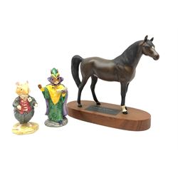 A Beswick Arab Xayal Connoisseur Horse in matt brown, upon a wooden base, together with two Royal Doulton figures, Mystic Bunnykins, and Dusty Dogwood. (3). 