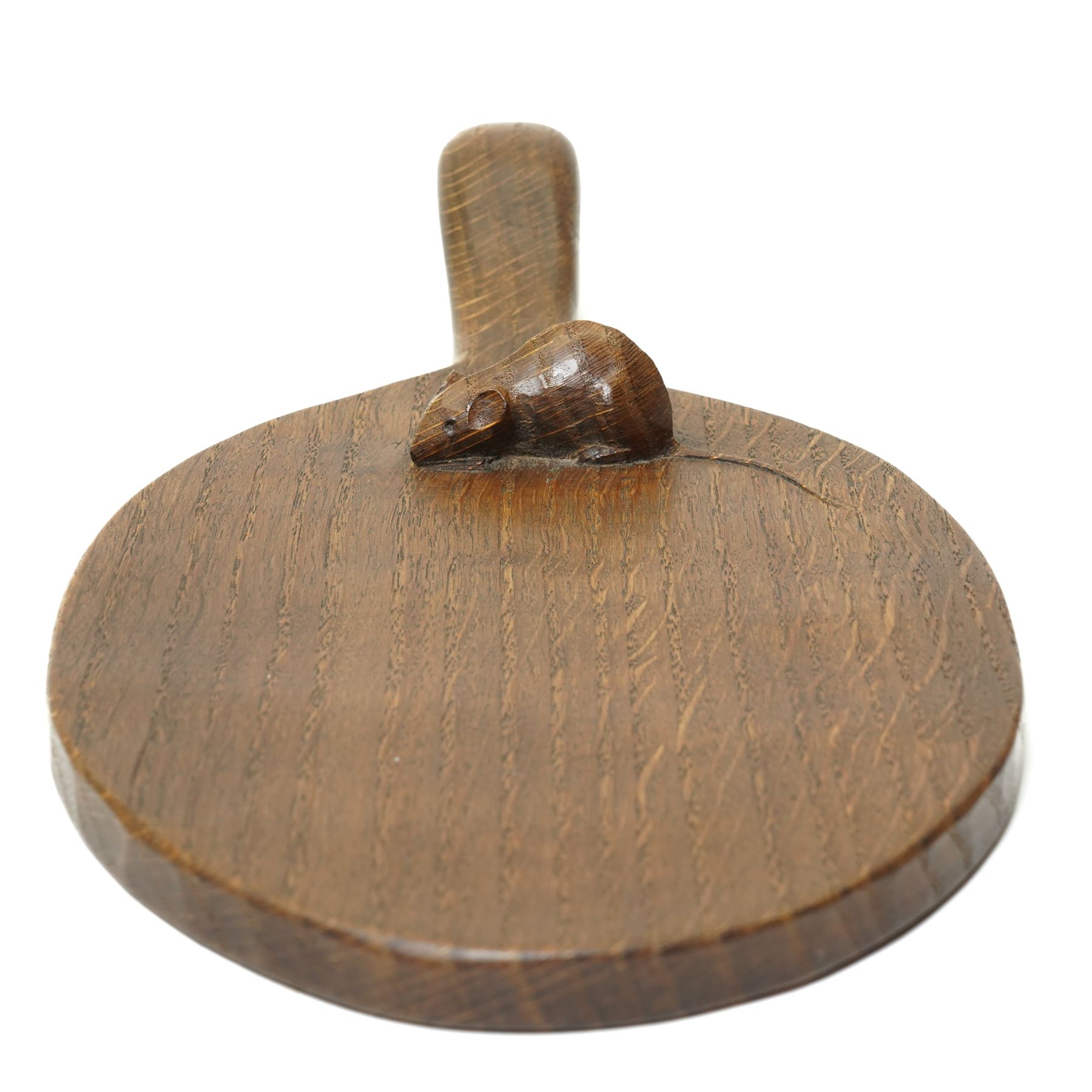 Mouseman - circa 1940s/50s oak cheese board, oval form with handle, good colour, the board with carved mouse signature, by Robert Thompson of Kilburn