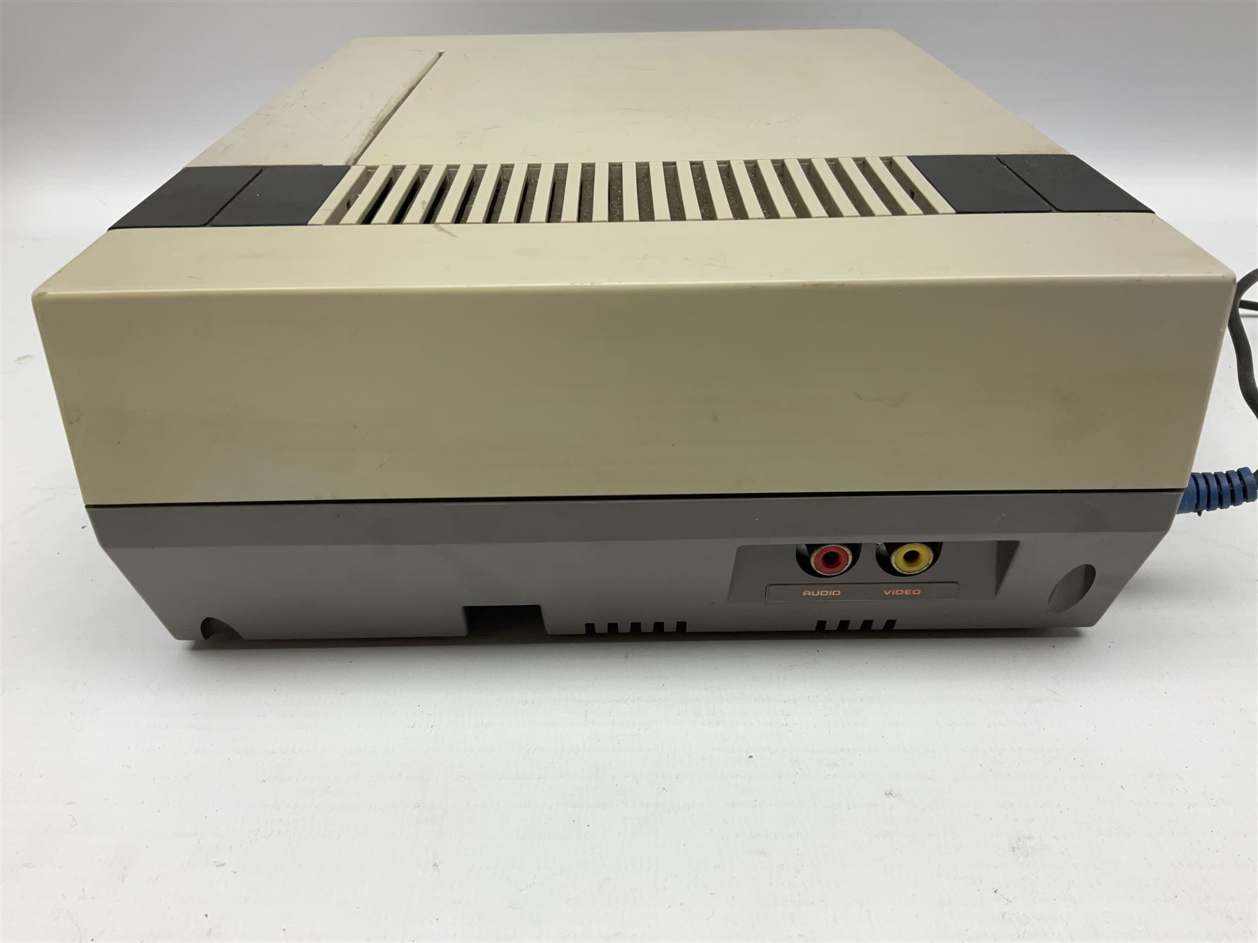 Nintendo Entertainment System (1985) console with two controllers, accessories and instruction booklet. NES Games ‘Duck Hunt’ with Nintendo Zapper gun, ‘Pinball’ and ‘Super Mario Bros.’, all with original sleeves and instruction booklets. NES game ‘Super Mario Bros. 2’ cartridge only