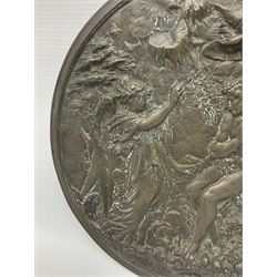 Late 19th century bronze plaque, of circular form, depicting the angel appearing to Adam and Eve in the garden of Eden in high relief, D25.5cm
