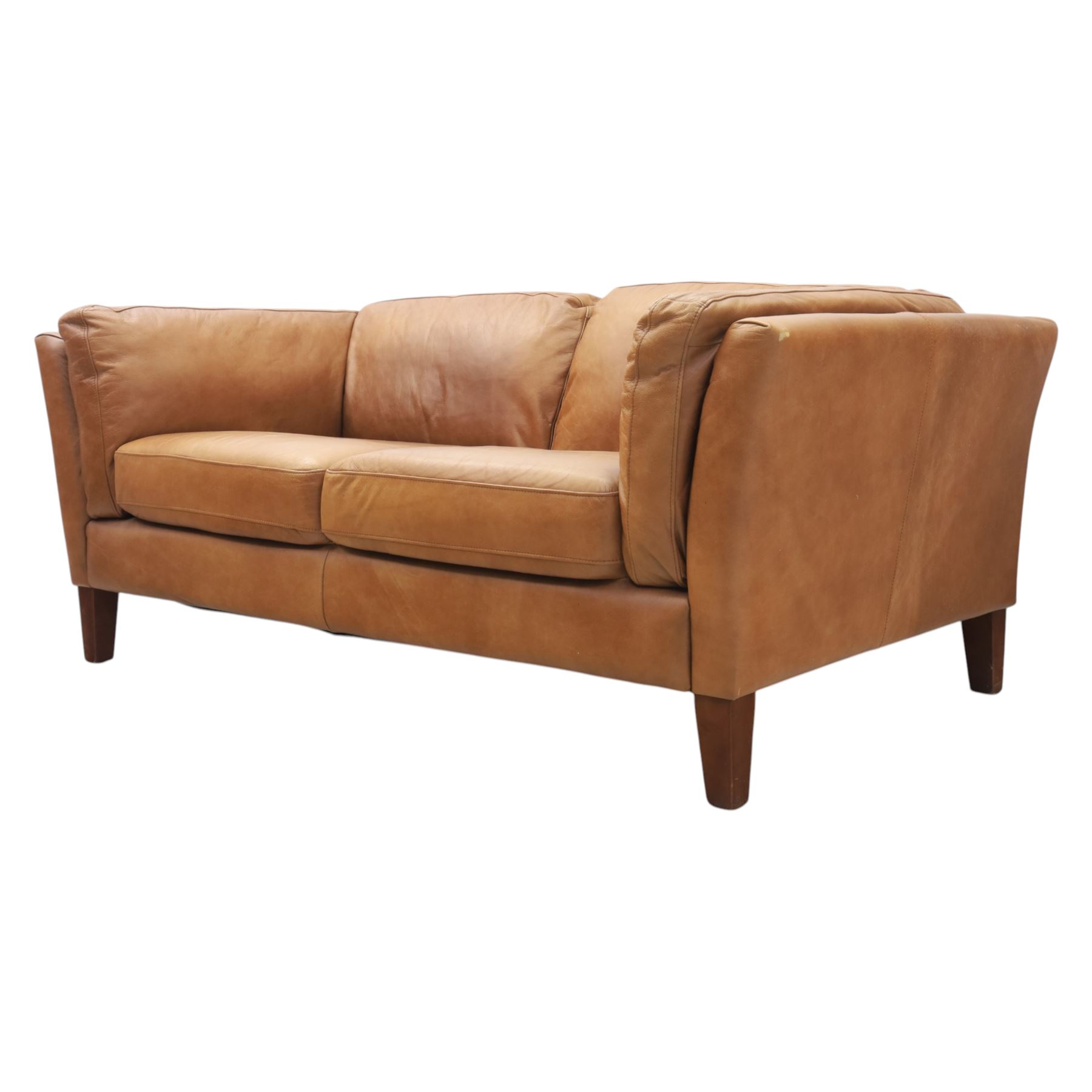 Two seat sofa upholstered in tan leather