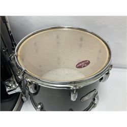 Pearl Vision SST Birch Ply shell four-piece drum kit in black comprising bass drum with foot pedal and three graduated toms; together with Pearl Custom Alloy Sensitone steel snare drum, drum and cymbal stands, microphone stand, stool and various drum sticks 