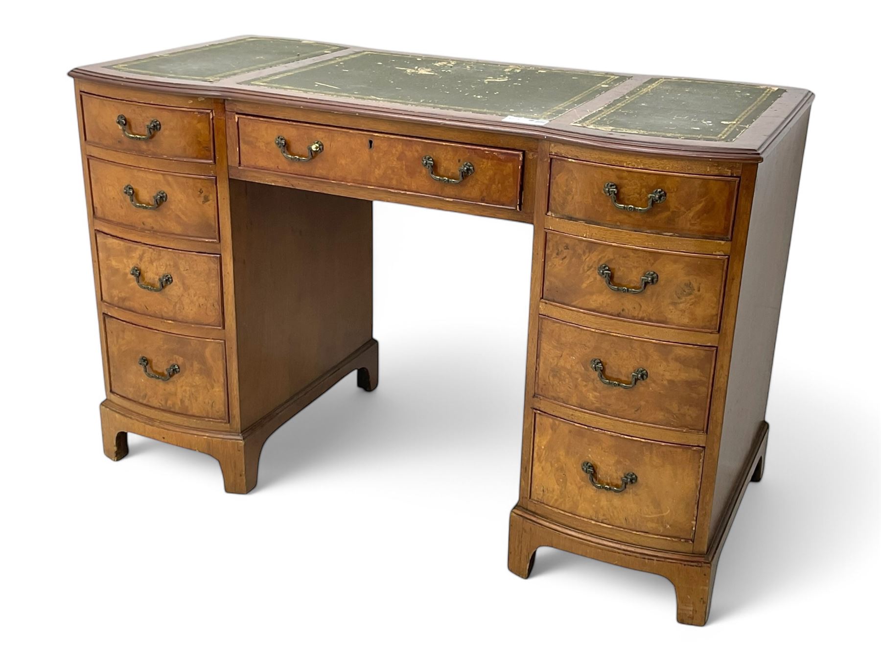 Queen Anne design burr walnut pedestal desk, of serpentine form with green tooled leather inset top, nine drawers with brass swan-neck handles, raised on bracket feet, in three parts
