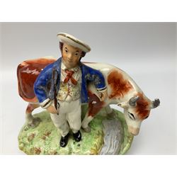 Pair of Victorian Staffordshire Pottery Figures, modelled as a milkmaid and farmer with cows, on naturalistic modelled oval bases, together with  pair of Staffordshire figures, modelled as the Cobbler Jobsons and His Wife Nell, both seated, tallest example H21cm