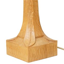 Mouseman - tooled oak table lamp, tapered octagonal stem terminating to square base carved with leaf motifs, with red shade, including shade H60cm, and with carved mouse signature, by the workshop of Robert Thompson of Kilburn