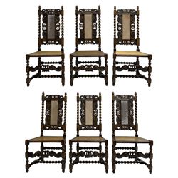 Set six 19th century oak Carolean style dining chairs, the cresting rail with open crown flanked by putto, spiral turned uprights with pineapple finials, canework seat and back, the seat rails carved with foliage, spiral turned supports joined by s-scroll and open crown carved front rail, decorated with flower heads, each with upholstered seat pad