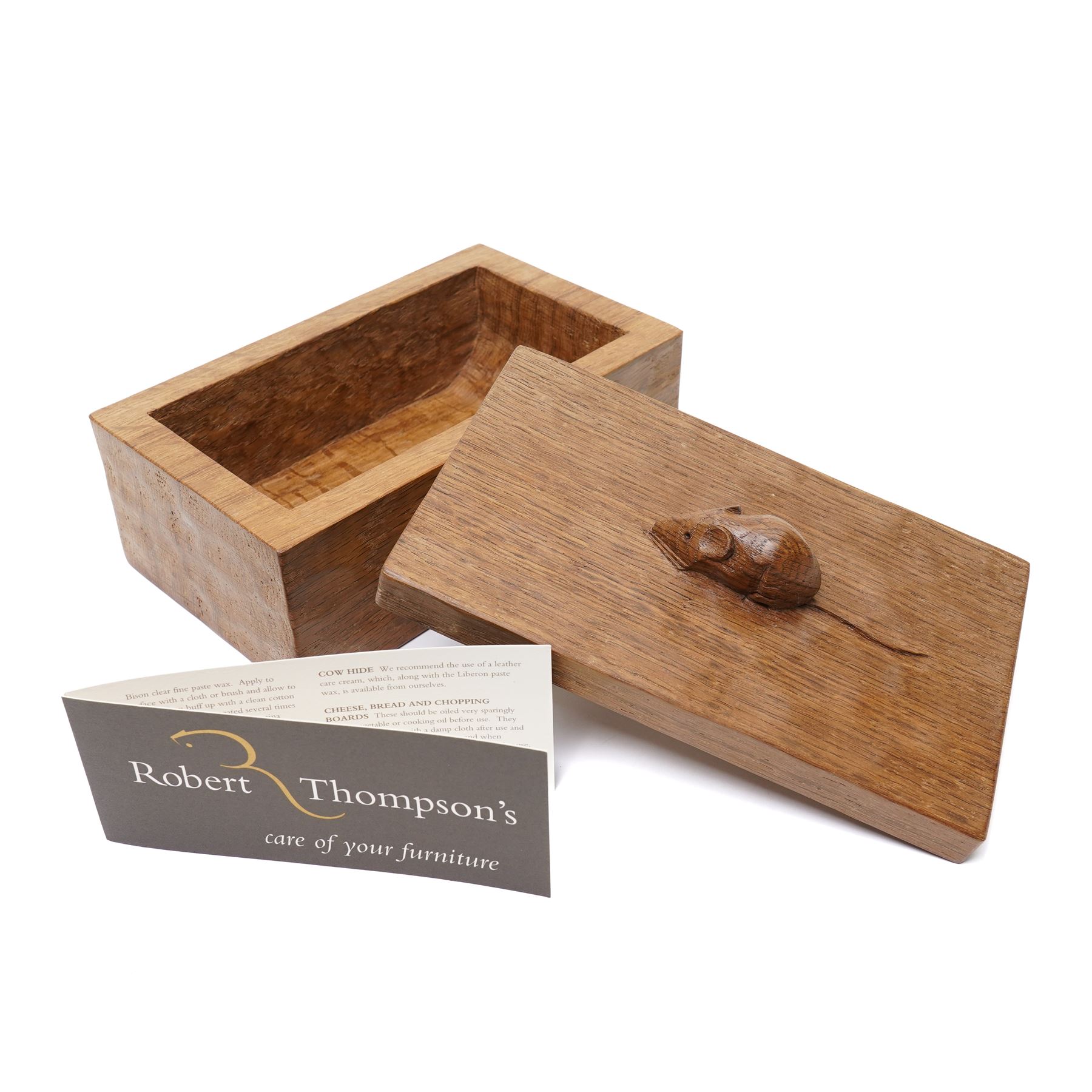 Mouseman - adzed oak rectangular trinket box, the cover with carved mouse signature W18.5cm by the workshop of Robert Thompson, Kilburn