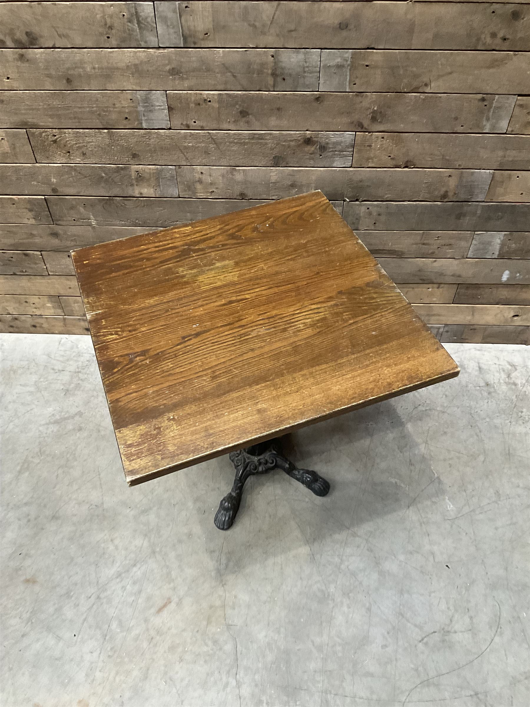 Cast iron Britannia circular pub table, and two pedestal cast iron bases (3)