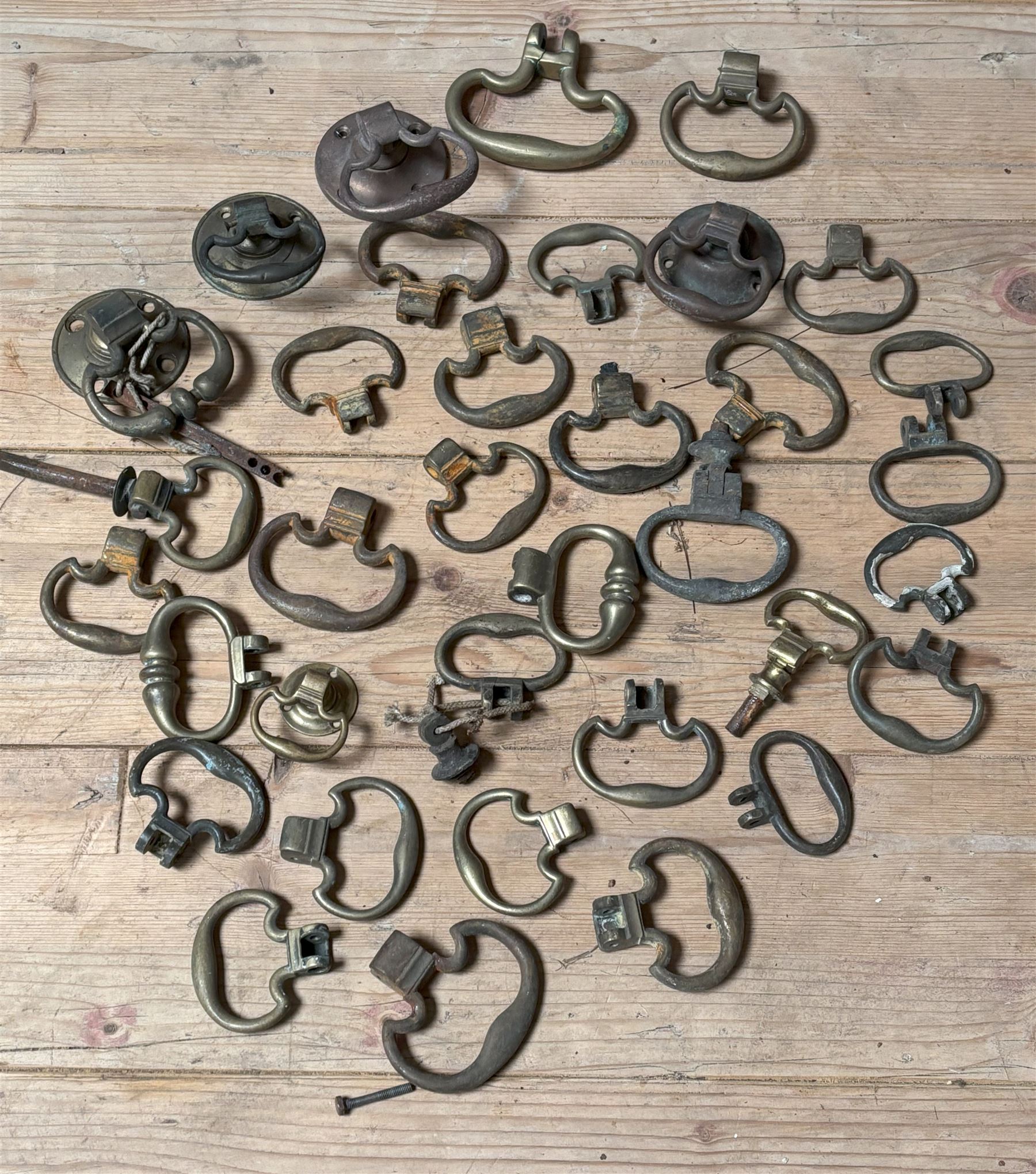Collection of Georgian brass drop loop handles.  - COLLECTION BY APPOINTMENT FROM: The White House, Thirsk Road, Easingwold, York, YO61 3NF - CALL 01723 507111 TO ARRANGE