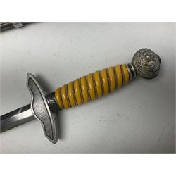 WW2 German Luftwaffe 2nd Pattern Officers dress dagger, with unmarked 25.5cm double edged steel blade, wire-bound pale orange/yellow celluloid grip, globular  pommel with oak leaves and traces of gilding, Luftwaffe eagle cross guard; in beaded scabbard with two suspension rings L43cm overall