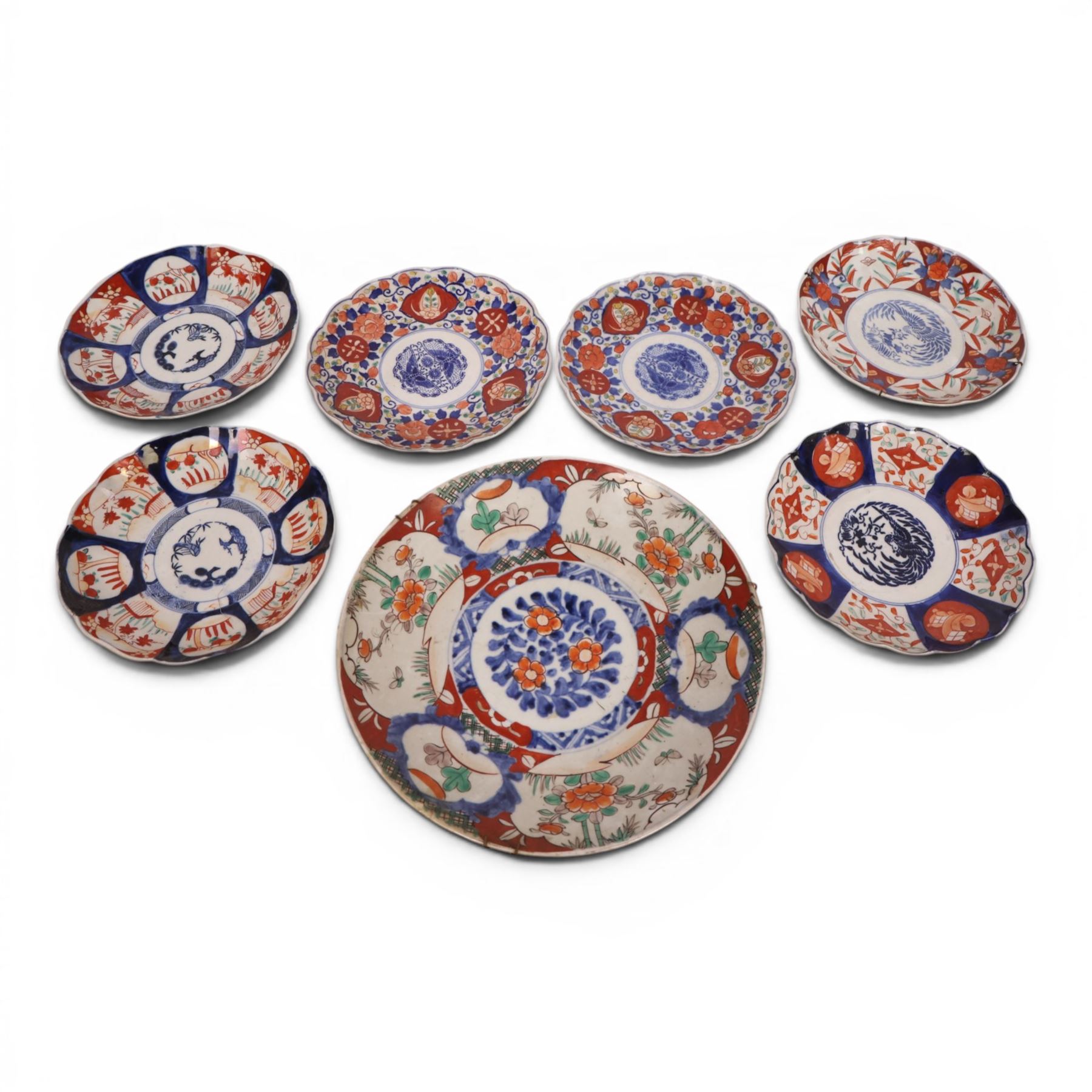 Collection seven 19th century Japanese Imari plates, six with scalloped edges, largest D30cm 