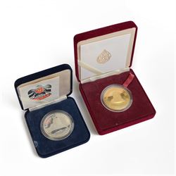 United Arab Emirates 1996 '25th National Day' gold 1000 dirhams coin, and a United Arab Em...