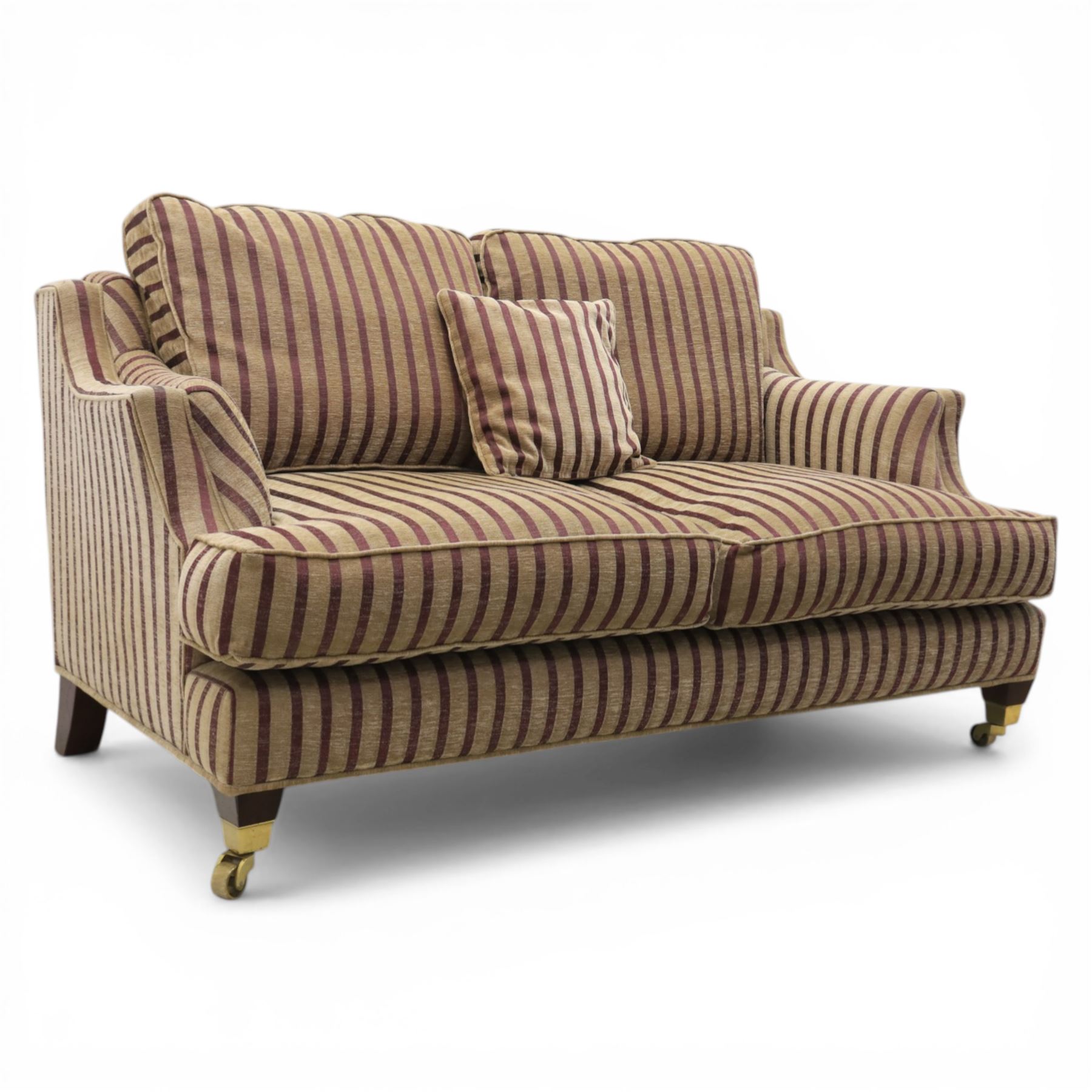 Late 20th century fabric upholstered sofa, with loose back and seat cushions, broad padded arms with piped borders, upholstered in striped textile, raised on concealed feet