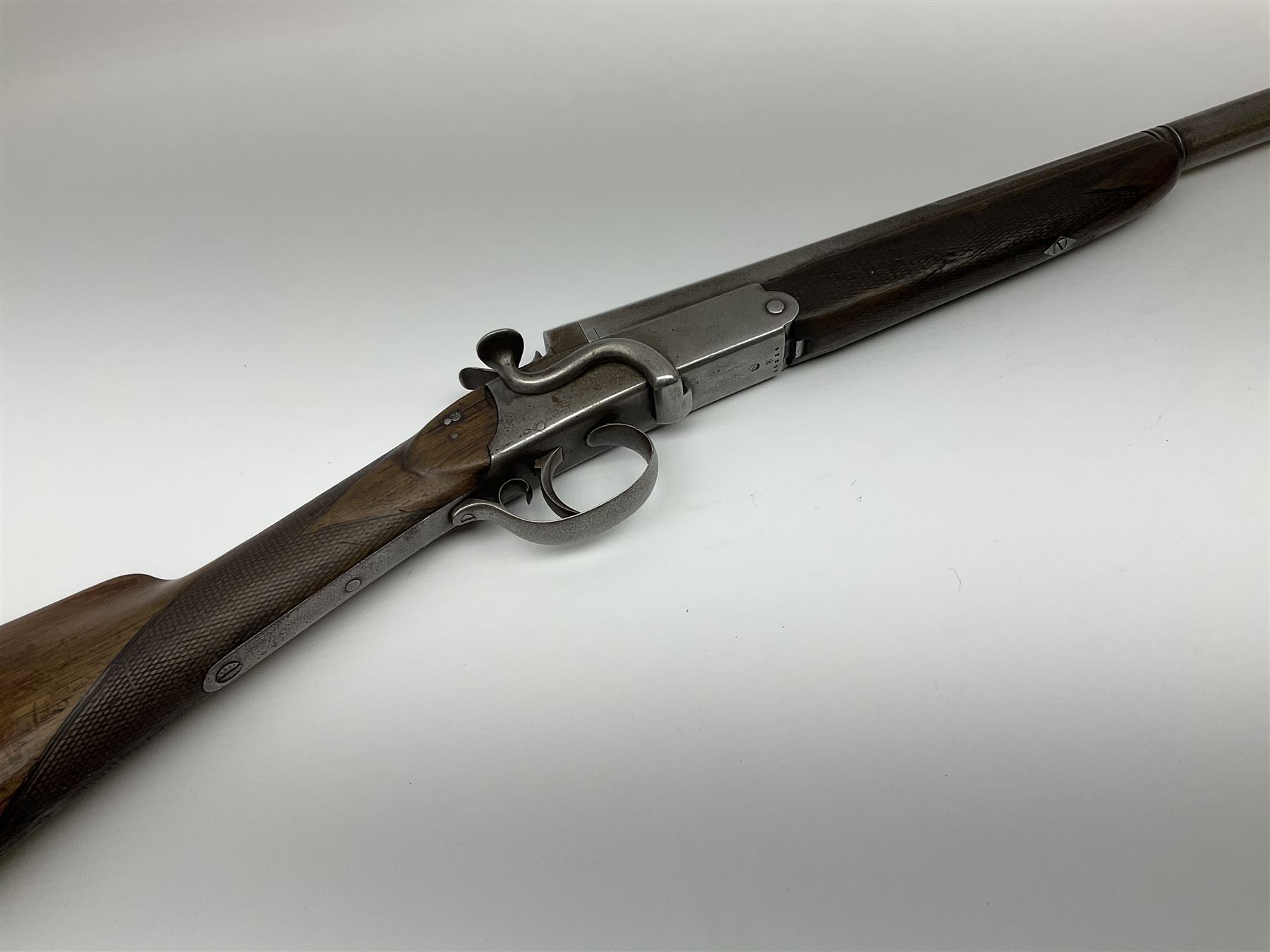 W. Horton 98 Buchanan Street Glasgow 20-bore single barrel centre hammer sporting gun, 71cm octagonal to round barrel with side lever opening, walnut stock with chequered grip and fore-end and steel butt plate, serial no.40334, L110cm SHOTGUN CERTIFICATE REQUIRED