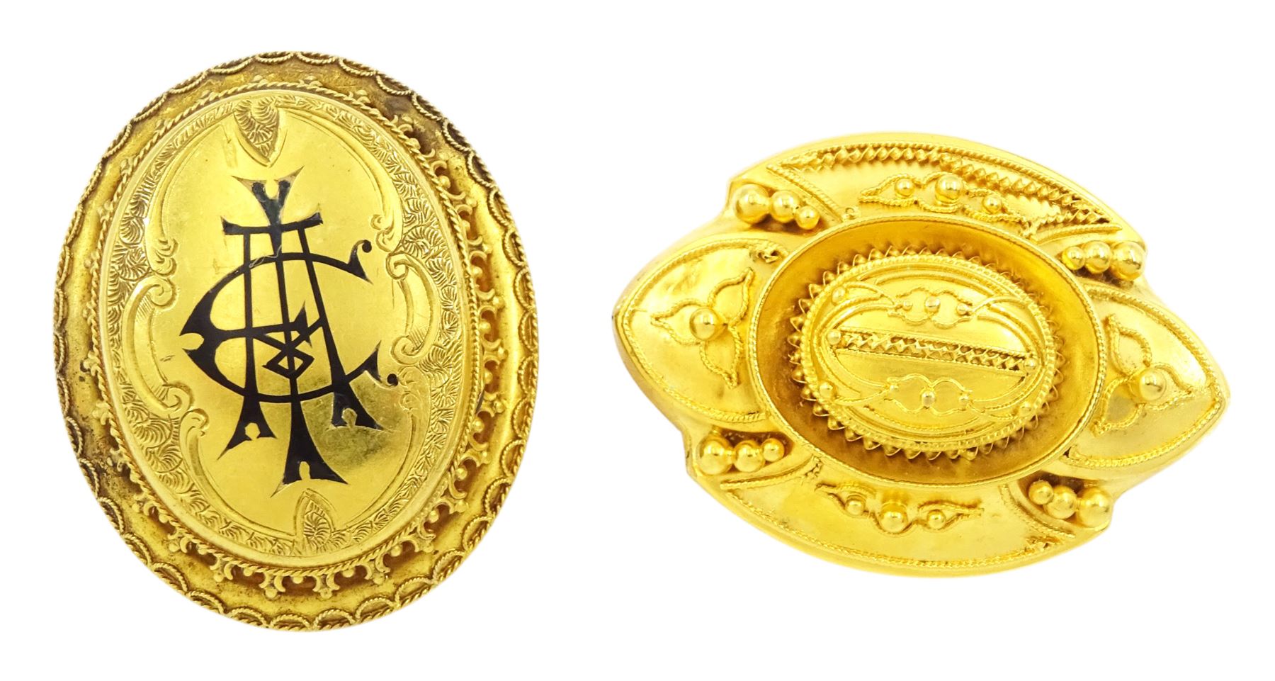 Victorian gold hinged locket brooch, the monogrammed black enamel front revealing hairwork glazed locket and an Victorian 18ct gold Etruscan design brooch