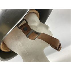 Two 1960s East Block Soviet style helmets - Czechoslovakian and Russian; both with liners (2)