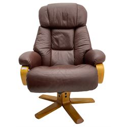 Light wood framed reclining swivel armchair upholstered in real leather.
