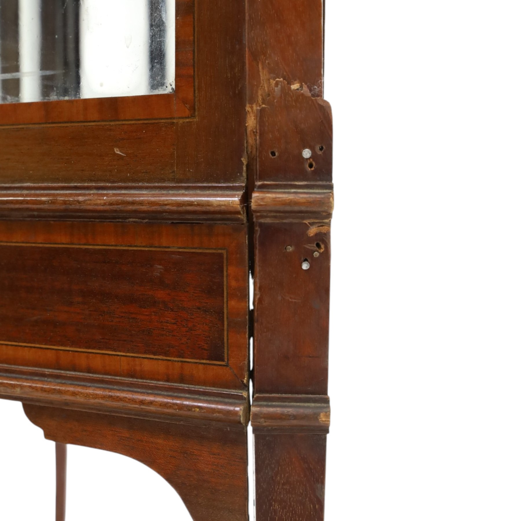 Edwardian inlaid mahogany display cabinet of rectangular canted form, galleried top with crossbanded inlay, above a glazed cabinet enclosing  baize lined shelves, raised on square tapering legs terminating in spade feet  