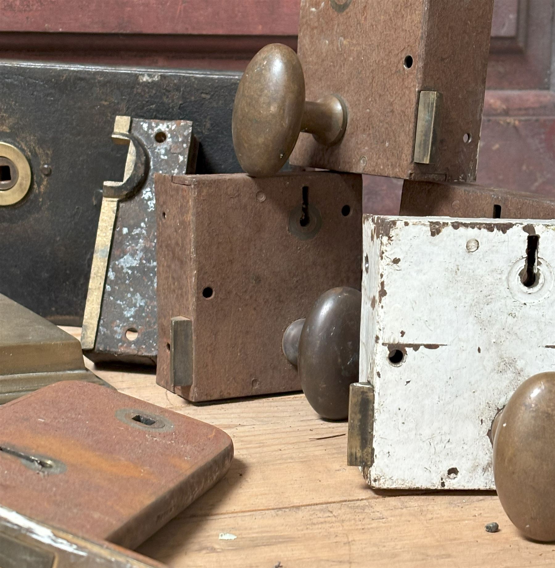 Large Scottish brass rim lock with key, 19th century (W22cm) together with two late Victorian steel cased rim locks with keeps (W23cm) a set of four early 20th century early 20th century surface locks with brass handles, and three mortice locks (10)  - COLLECTION BY APPOINTMENT FROM: The White House, Thirsk Road, Easingwold, York, YO61 3NF - CALL 01723 507111 TO ARRANGE