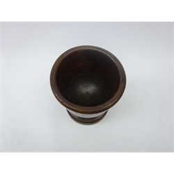  19th century turned lignum vitae pestle & mortar, turned goblet shaped mortar on circular base, turned tapering pestle, H18cm pestle L24cm   