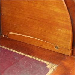 Victorian mahogany twin pedestal cylinder desk, with roll top with fitted interior and with leather writing slide, raised on pedestals with three graduating drawers, raised on a plinth base with castors
