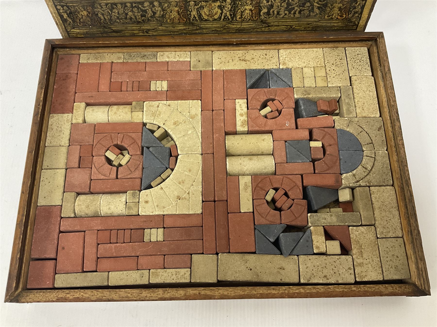 Richters 1880s Anchor Box Stone Block Building set, in original wooden box with sliding lid and paper label; with two instruction booklets, circa 1880-1900s