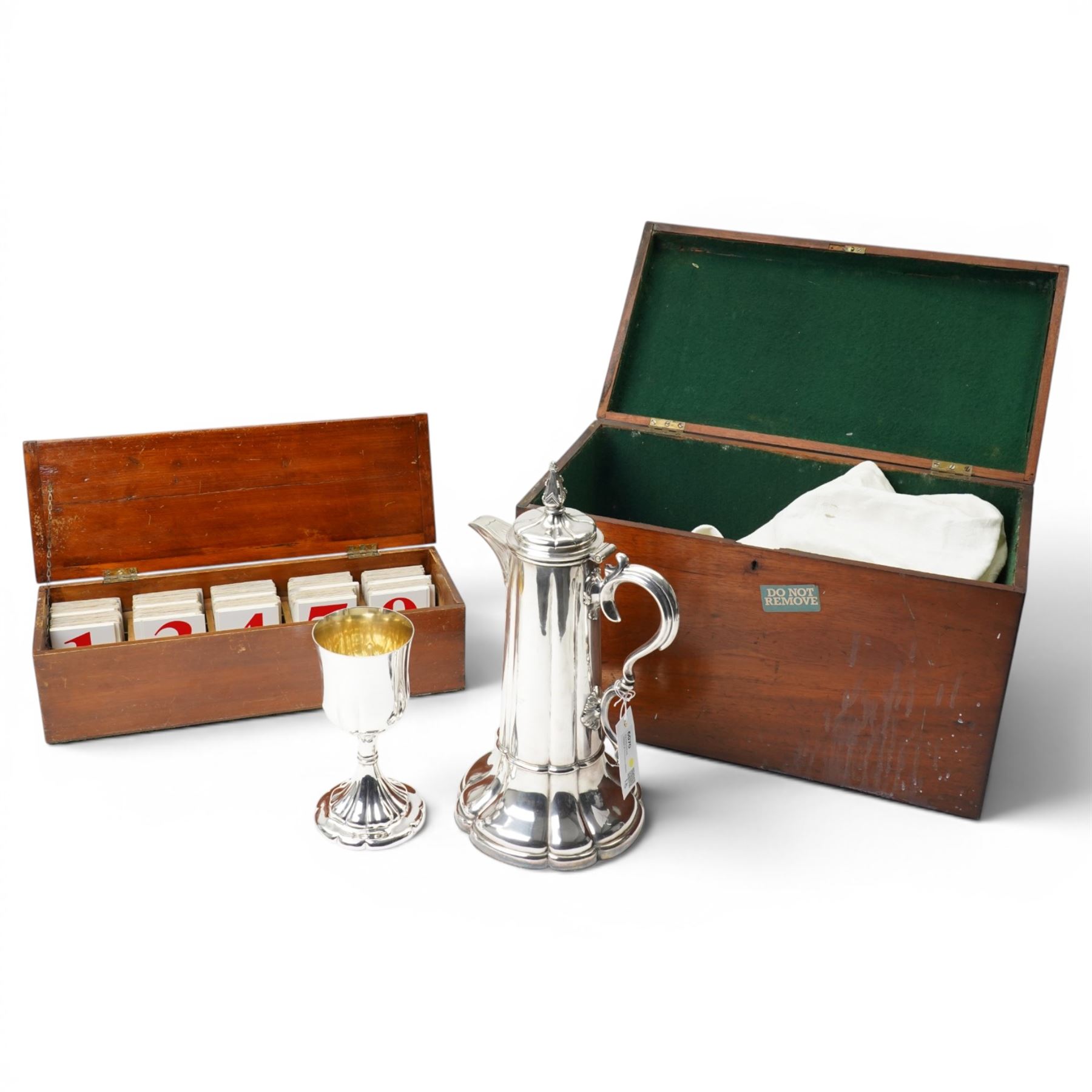 Large silver plated flagon probably by James Dixon with tapering lift, scroll handle and spreading lobed base H37cm, plated chalice with gilded interior by the same maker H21cm, plate chest with baize lined interior and countersunk handles W52cm and a pine stationery box