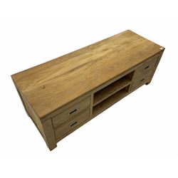 Hardwood entertainment console unit, fitted with two shelves and four drawers
