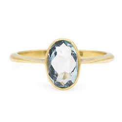 Early 20th century 18ct gold aquamarine ring, set with a single bezel set, oval cut aquama...