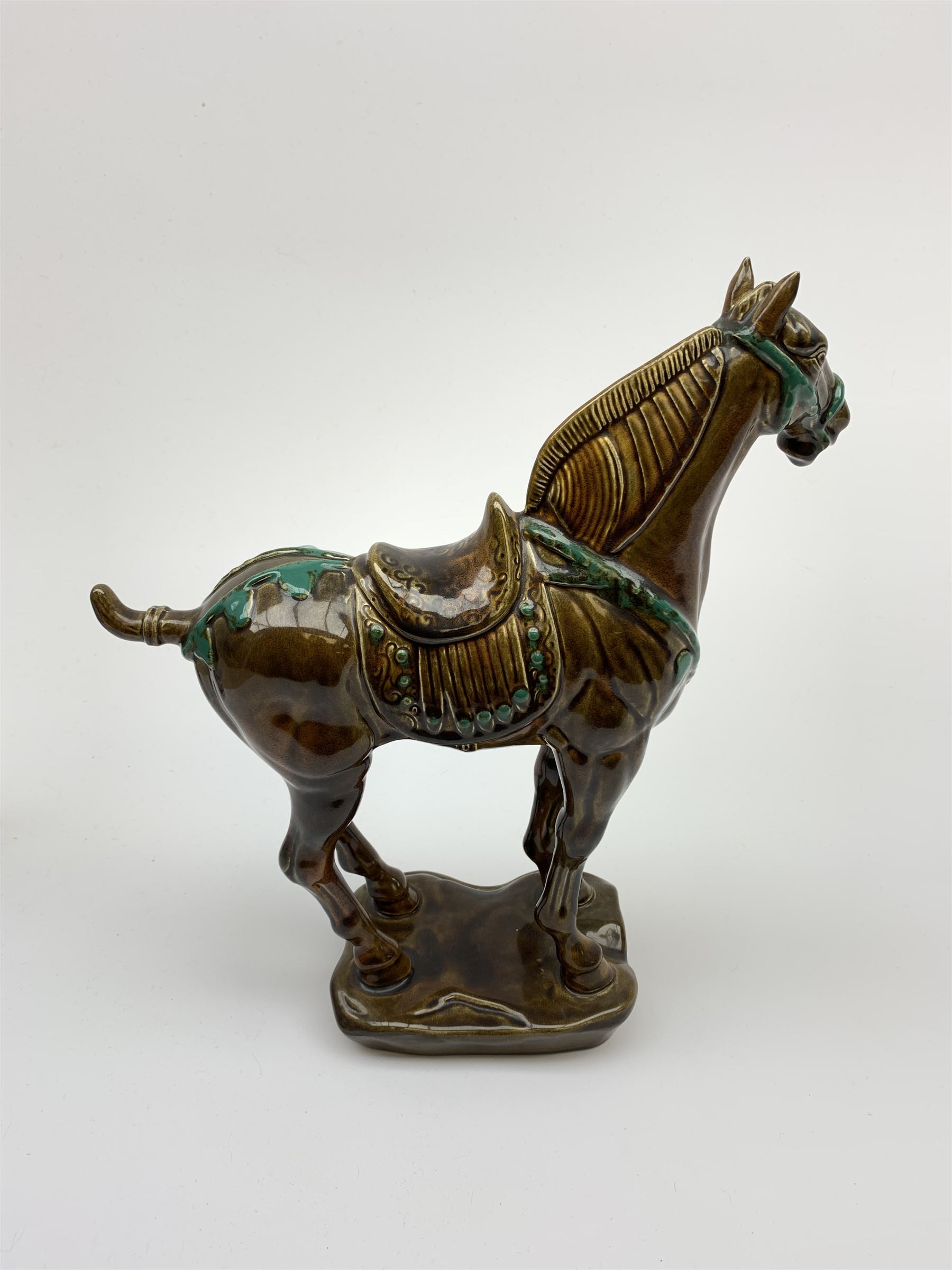 A large Beswick figure modelled as a Tang horse, with impressed marks