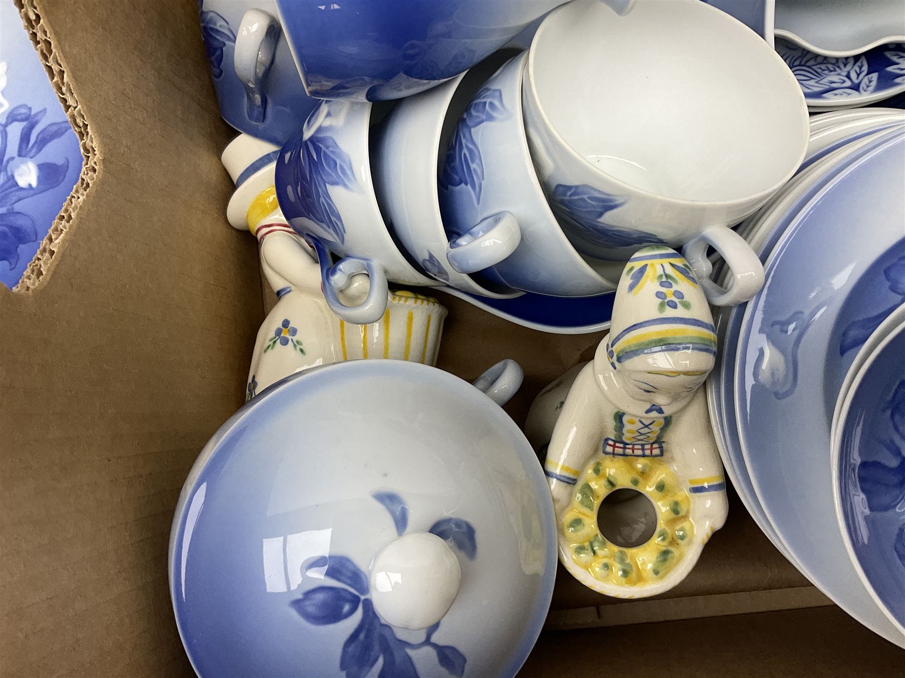  Bing & Grondahl, Copenhagen blue and white Christmas Rose pattern tea wares, to include teapot, covered sucrier, milk jug, fourteen cups and seventeen saucers, etc, together with two Royal Copenhagen collectors plates etc  
