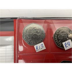 Queen Elizabeth II mostly currently circulating commemorative fifty pence coins, including Kew Gardens 2009, London Olympic Games including table tennis, offside rule, Peter Rabbit 2018 etc, old style dual dated 1992 1993 and a small number of other old style fifty pence coins, in one green ring binder folder