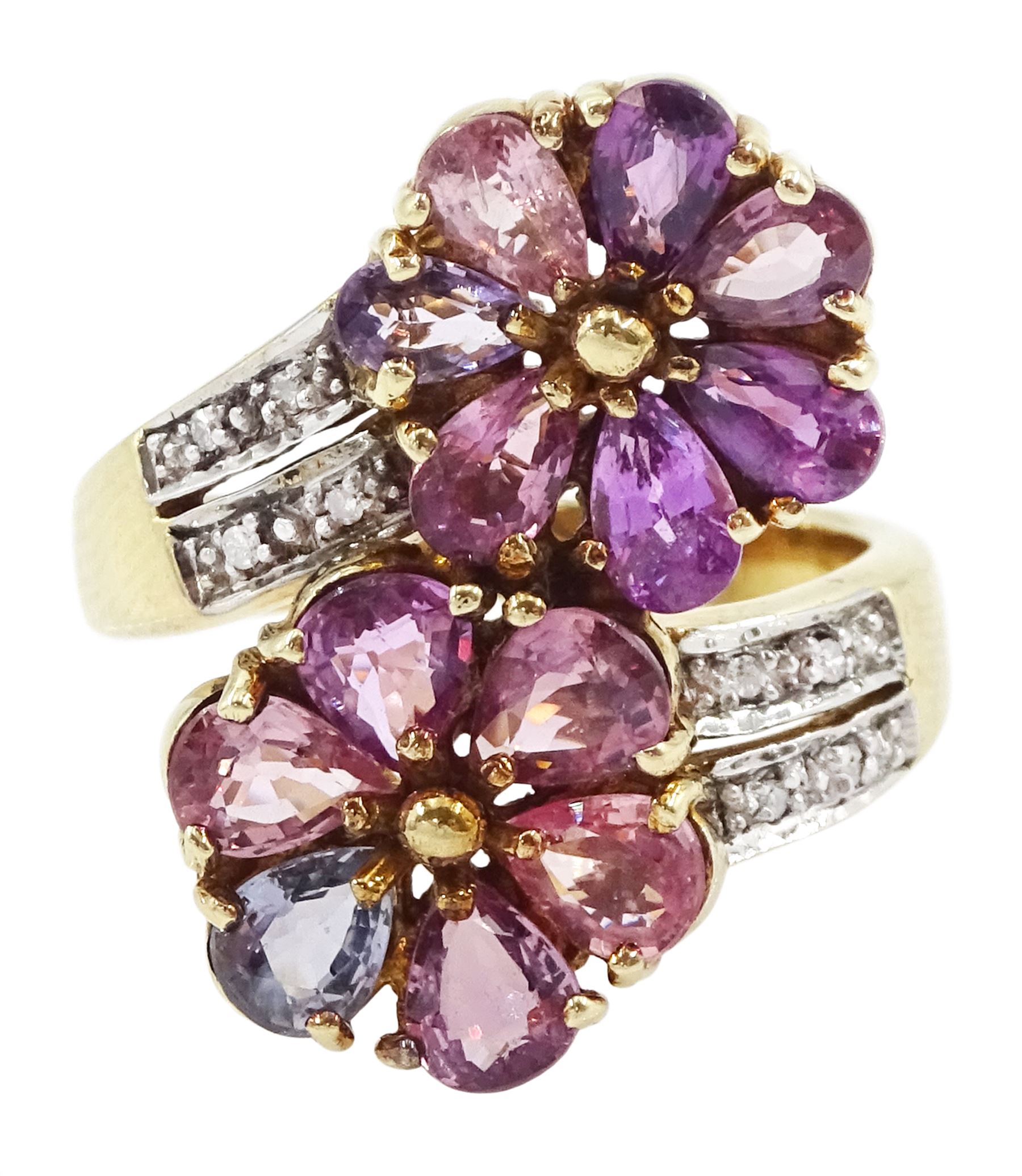 9ct gold sapphire and diamond flower head crossover ring, two flowers each set with pear cut, multi-coloured sapphires, to split diamond set shoulders, Birmingham 2006, total sapphire weight approx 3.30 carat