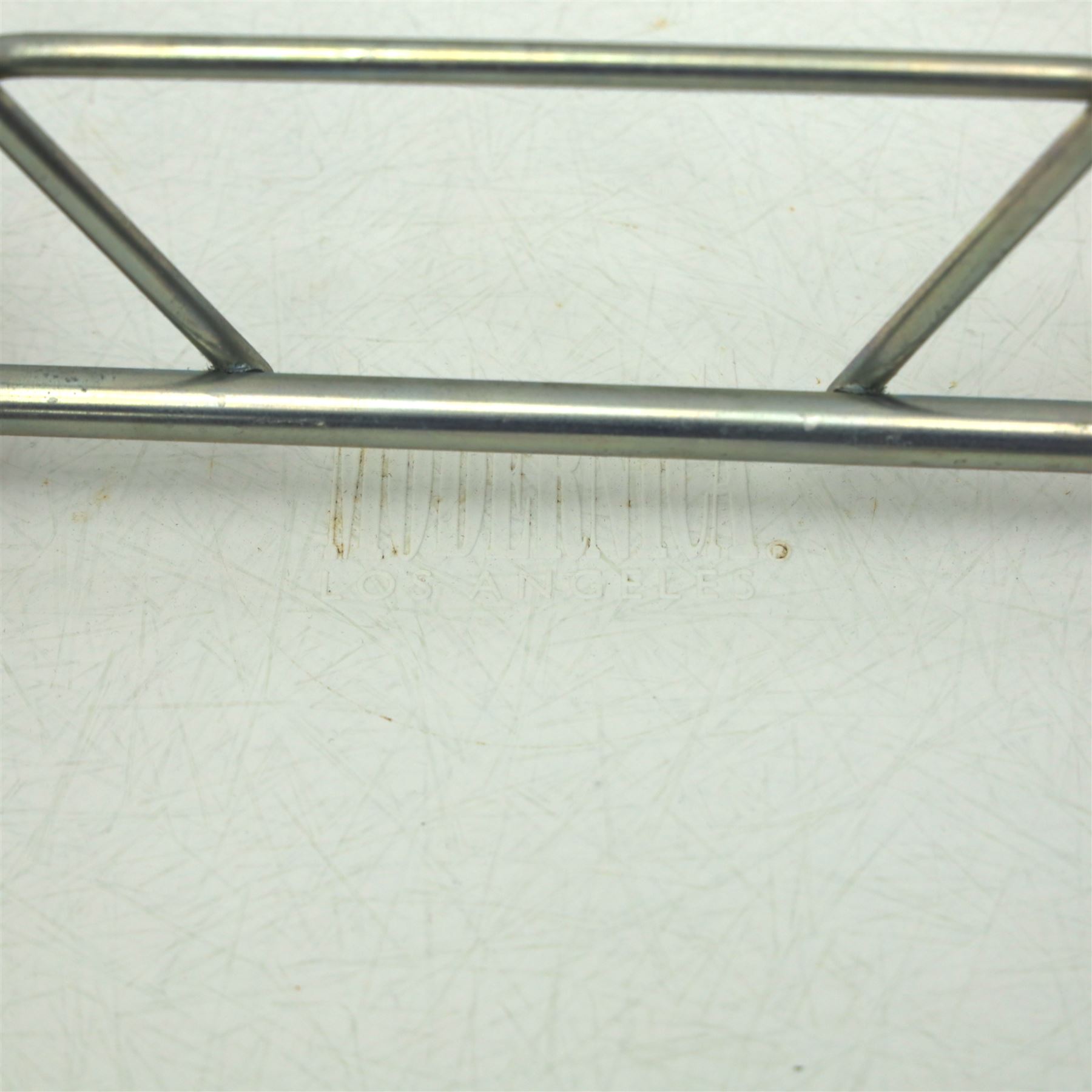 Modernica Los Angeles - RAR rocking chair, moulded white fibreglass shell with integrated arms, raised on chrome wire supports with shaped stained wooden rocking runners