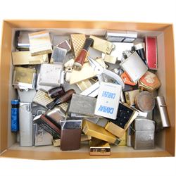 Large collection of lighters, including novelty gun and camera examples, Art Deco table lighter by Benlow Golmet, circular John F Kennedy example and other smoking accessories