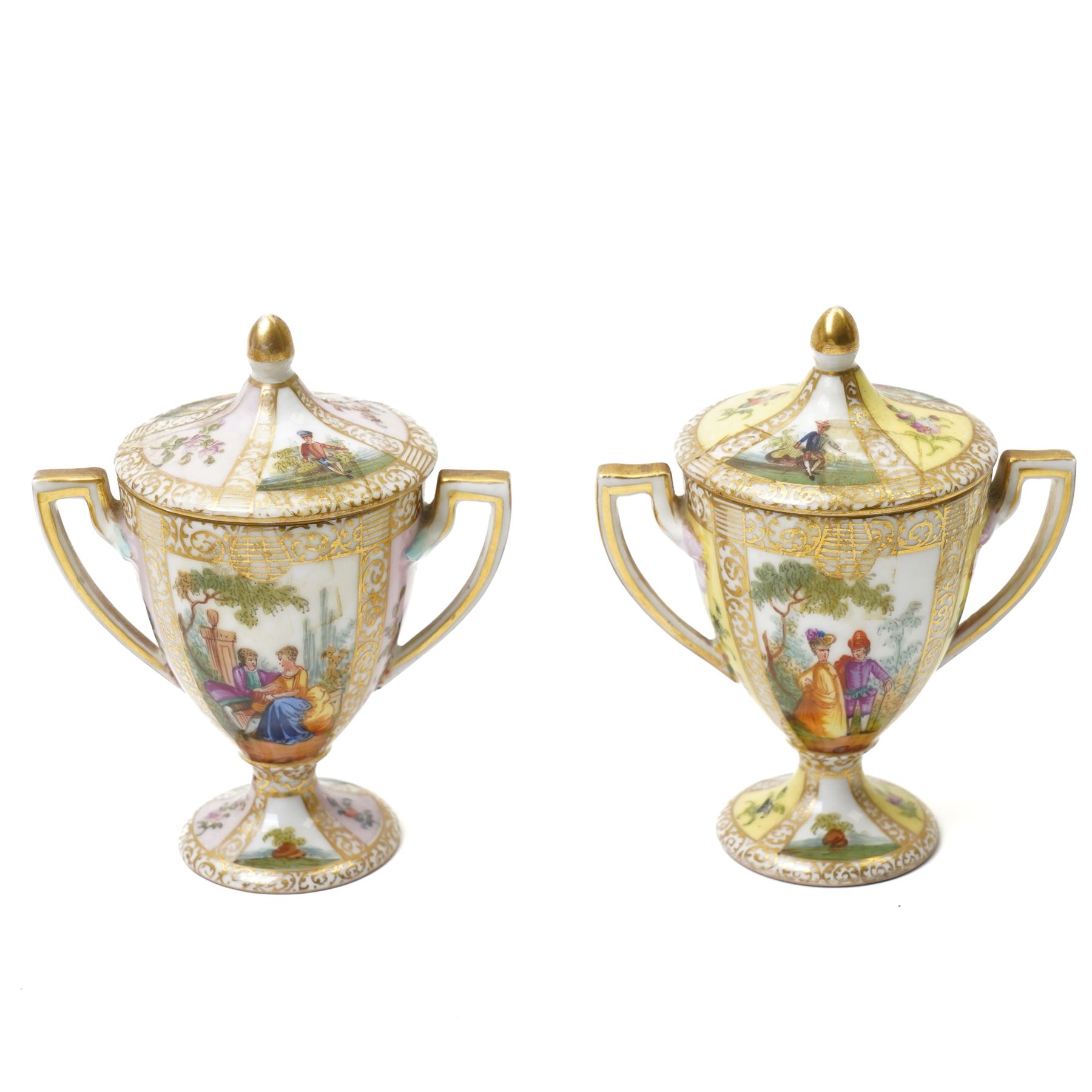 Collection of Helena Wolfsohn Dresden porcelain works, comprising a quatrefoil dish, D24cm, a chocolate cup with socketed saucer, two teacups, one with saucer, and a pair of twin-handled covered cups, each decorated with panels of flowers and courting scenes, various blue marks to bases