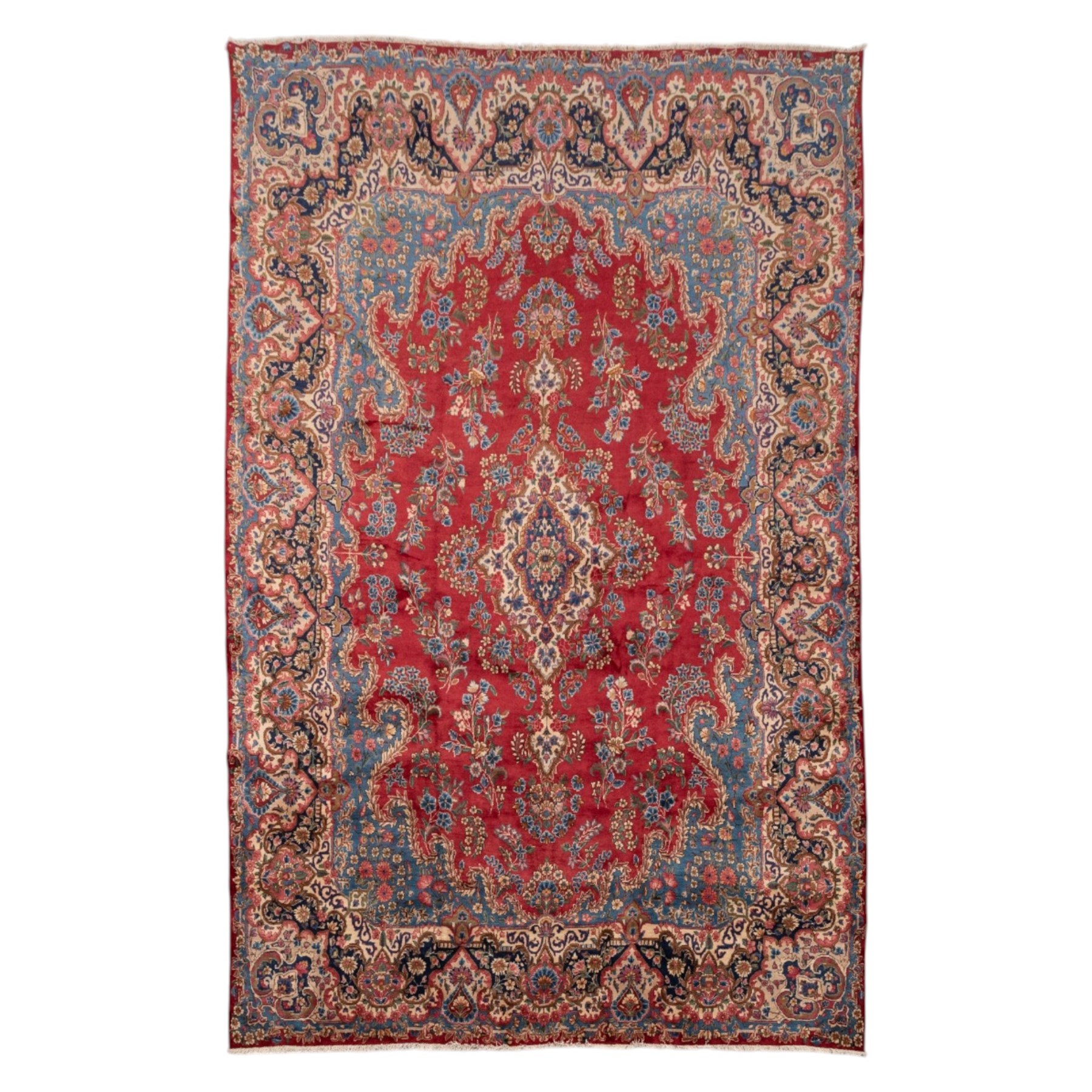 Fine Persian crimson ground Kashan carpet, the busy field with a central floral pole medallion surrounded by bouquets of flowerheads and trailing foliage, the shaped cyan spandrels similarly woven, enclosed by a wide foliate guard band of stylised palmettes and floral designs