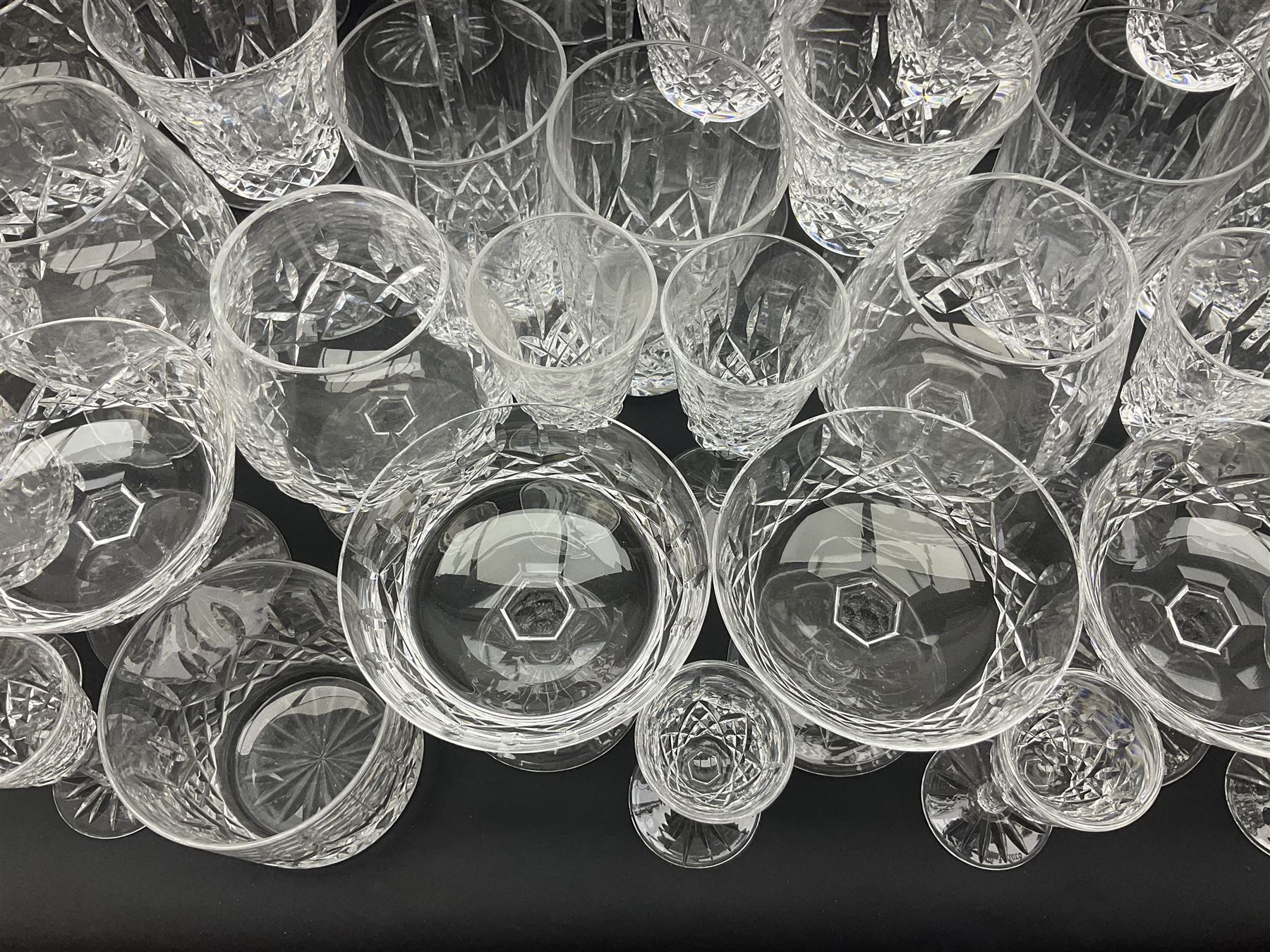 Set of Waterford Crystal Lismore pattern drinking glasses for six people, including hock glasses, goblets, champagne flutes,  sherry glasses, liqueur glasses, hi ball glasses, whisky glasses, brandy balloons, etc, all with etched maker's mark beneath  (62)