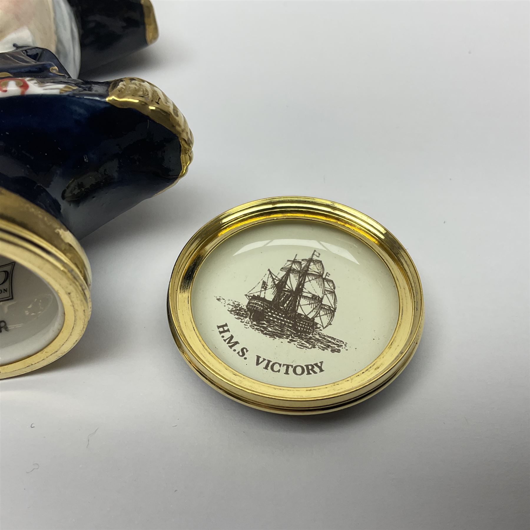 Halcyon Days bonbonniere, modelled as 'Vice-Admiral Lord Nelson', to mark the bicentenary of the British victory at the Battle of Trafalgar, together with another Halcyon Days enamel box depicting Lord Nelson, both boxed 