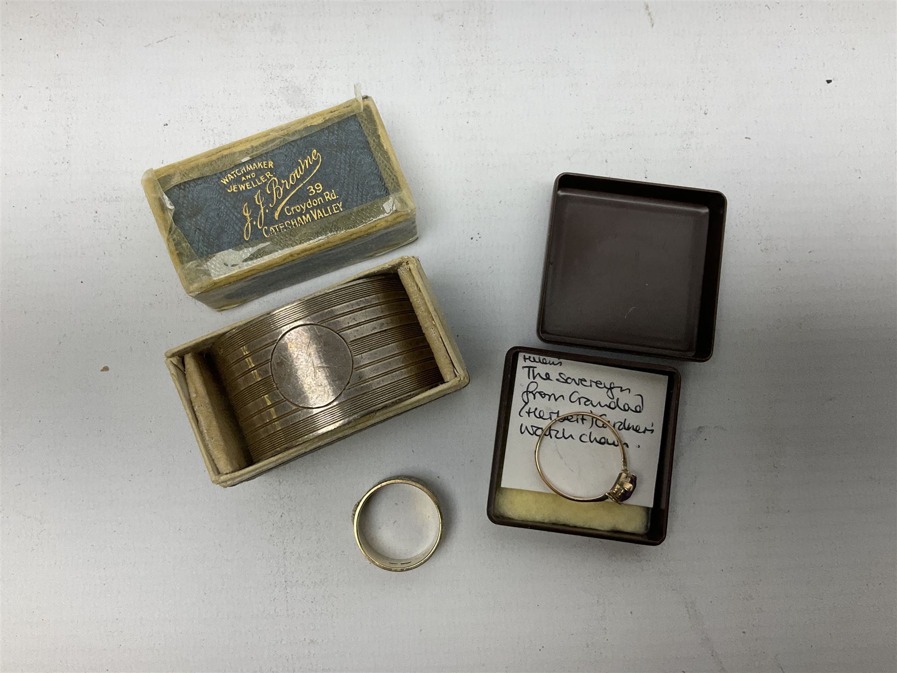 9ct gold stone set ring, silver napkin ring hallmarked Chester and a hallmarked silver gilt ring