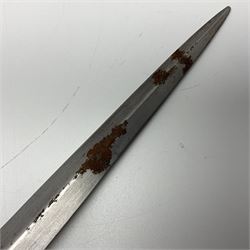 First Pattern Fairburn Sykes ''F-S'' Fighting Knife by Wilkinson Sword Ltd., the 17cm double edge steel blade with raised medial ridge to each side, each side of the ricasso with a recessed panel, one side with maker's name, the opposing side etched THE F~S FIGHTING KNIFE, with nickel plated brass recurving crossguard and diamond cut grip; in leather scabbard with metal chape