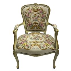 Near pair of French Louis XVI design lacquered hardwood-framed parlour elbow chairs, moulded flower head cresting rail over scrolled arm terminals, back and seat upholstered in prink and cream floral and urn decorated tapestry fabric, on cabriole supports, in craquelure cream finish with painted gilt piping