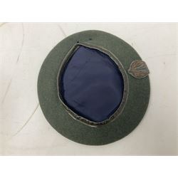 Four paratrooper berets - Russian, Italian, British and Foreign Legion; all with badges (4)