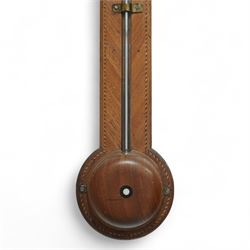 Stampa- George III early 19th-century mercury stick barometer in a mahogany case with a broken pediment and round base, case with chequered inlay to the edge and cistern cover, visible full length bulb cistern tube recording barometric air pressure from 27 to 31 inches with predictions, rectangular silvered register and vernier, with a spirit thermometer indicating the temperature in degrees Fahrenheit.
Mercury present in good condition.
Stampa is recorded as working in London as a barometer and looking glass manufacturer.